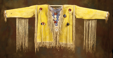 A Southern Cheyenne beaded shirt, circa 1870, in yellow ochre native tanned hide sold for $43,125.