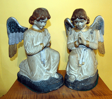 The two folk art carved angels, American or European and from the first half of the Twentieth Century, were seen at J.D. Querry Antiques, Altoona, Penn.