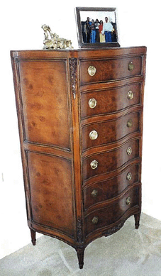 Antique six-drawer mahogany, bowfront high chest with original brass fittings.