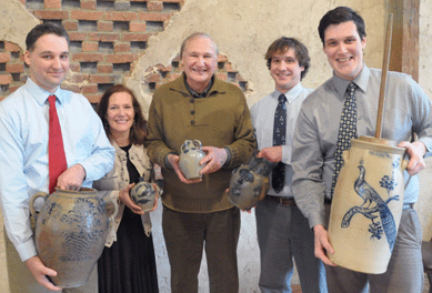 The Zipp family with treasures from the auction. From left, Brandt, Barbara, Tony, Mark and Luke Zipp.