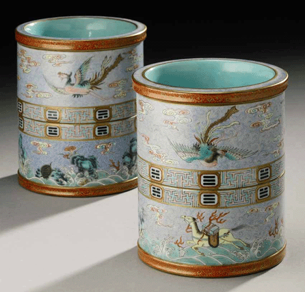 Two rare famille rose revolving brushpots, Qianlong mark and period, 4¾ inches, sold for $1,538,500 and $1,986,500.