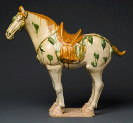 Sancai glazed pottery horse, Tang dynasty (618‹06). From the Collection of Jane and Leopold Swergold.