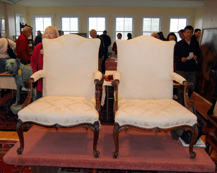 The chair on the left was made for the Duke of Marlborough and sold for $144,000. The example on the right was a purposeful copy and brought $480.  