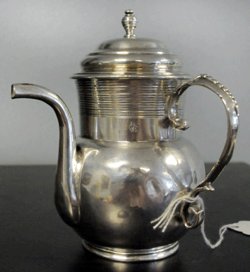 The action heated up when a small silver spout cup by colonial Boston maker John Coney (1655/56‱722) was offered. Listing a single family provenance having descended from Martin Brimmer (1697‱760), a politician and prominent businessman, member of the House of Representatives, the mayor of Boston and the first president of the Boston Museum of Art. Coney was considered one of the most important Boston silversmiths of his day and his apprentice at the time of his death was Paul Revere's father. The classic spouted cup, fitted with an elegant handle and lid, sold at $74,750. 