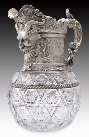 Gorham Manufacturing Company of Providence, R.I. (1831⁰resent), won a total of 30 awards in the gold and silverware category at the World's Columbian Exposition in Chicago in 1893, which celebrated the 400th anniversary of Christopher Columbus's discovery of America. This glass wine pitcher with silver gilding measures 12 by 9 by 7 inches and depicts a satyr on the spout with bacchantes amid clusters of grapes. The Nelson-Atkins Museum of Art, purchase: the Charlotte and Perry Faeth Fund. 