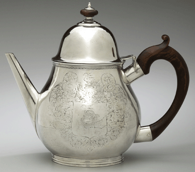 Made at the end of the Seventeenth Century when tea drinking was a rarity in the colonies, this teapot is a favorite of curator Hofer, because it is the earliest surviving teapot made in New York and "has such a pleasing, pudgy shape and lush engraving.†Pear-shaped, with a straight tapering spout and bearing the coat of arms of the Schuyler family, it was crafted for Elizabeth and Johannes Schuyler of Albany when they married in 1695.