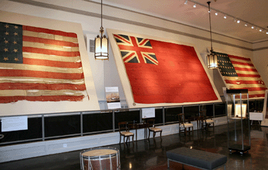 Left, this 31-star United States flag, $158,000, of 1851 may be the last ensign flown on the USS Constitution before it was decommissioned in 1855 at the Portsmouth Navy Yard. The arrangement of the stars is the same pattern as on the ensign used by Commodore Perry on his trip to Japan in 1853. Center, this English red ensign, $43,750, was used from 1801 to 1854 and was flown as a courtesy by American ships when visiting British ports or returning a salute from a Royal Navy warship. Right, this circa 1846 ensign, $134,500, of the USS Constitution has 26 stars commemorating the admission of Texas with two additional stars for Iowa and Texas. Freeman's, Collection of H. Richard Dietrich, Jr. ⁌aura Beach photo