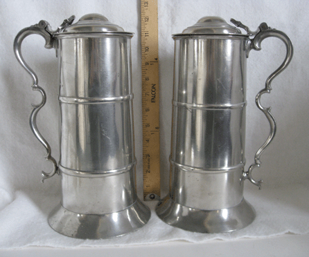 Among the historic items taken from the locked curio cabinet were these two pewter tankards and the pewter plate, which are more than 200 years old.