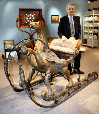 Leon Dalva of Dalva Brothers, New York City, assembled a unique display of objects with royal French pedigree. This Seventeenth Century carved and painted sleigh is thought to have been made for the Dauphin by Jean Berain, who created amusements for court. 