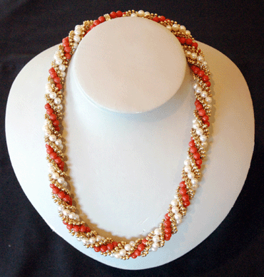 James Levinson, New York City, showed this Van Cleef & Arpels necklace of coral, pearls and 18K gold, circa 1965.