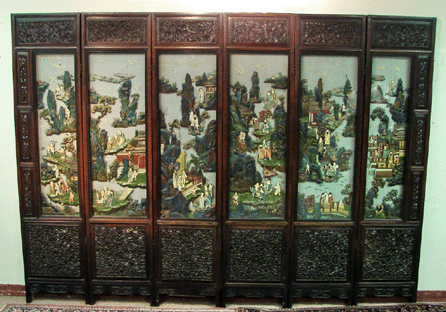 A six-panel carved Oriental screen sold at $61,360, the top lot of the day.