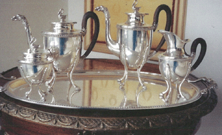 Turn of the century tea set comprising tray, coffee pot, tea pot, sugar and creamer. 