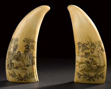 A pair of scrimshaw sperm whale teeth was engraved and polychromed by an unidentified artist from Nantucket, one with scenes of children with sailboats on a pond and the other depicting three generations of a family. Collection American Folk Art Museum, New York. ⁇avin Ashworth photo