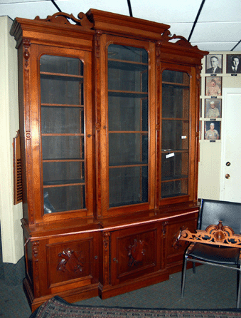 The large Victorian carved breakfront bookcase sold for $2,645.
