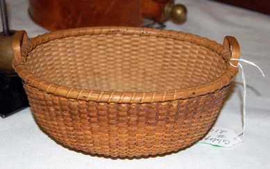 The Nantucket lightship basket retained the label of William D. Appleton and sold for $1,840.