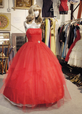 Dave Mason and Susan Marzan, West Cornwall, Conn., offered this stunner †a 1950s tulle gown with rhinestone trim. The "model†is wearing coordinating rhinestone earrings in her hair.