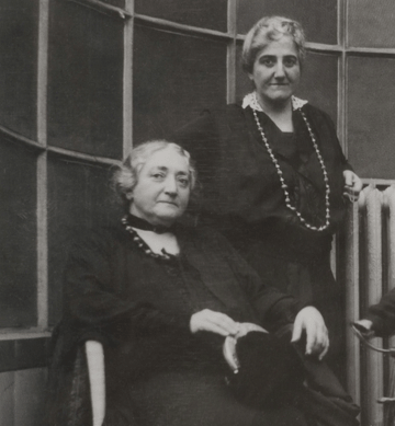 In spite of their differing personalities, Dr Claribel Cone, left, assertive, confident and outspoken, got along well with her younger, quieter and warmer sister Etta in most every respect, including their art-collecting pursuits. This circa 1924 photograph shows them, dressed in their usual black, modest, old-fashioned attire, in the Paris apartment of Gertrude Stein's relatives, Michael and Sarah Stein.