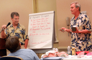 A seminar on "Cleaning and Care of Mechanical and Still Banks†was conducted Friday morning by Robert Brady, left, and Jim Yeager.