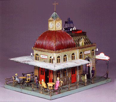 From the collection of German train stations was lot 319, Café Station, 1 gauge, by Marklin, circa 1905, 16½ inches long, tin and in bright, pristine condition. Ex-Ward Kimball Collection, it went just over the low estimate, selling for $18,375.