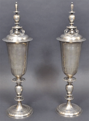 A pair of Tiffany silver garniture urns also did well, bringing $4,993.