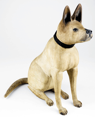 The handsome carved wood and painted bull terrier is made of pine, circa 1875‱900, by an unknown artist.