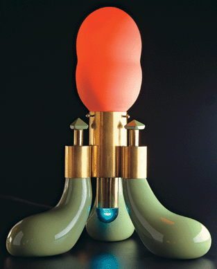 Dan Dailey, who was drawn to glass because of its color potential, created this hand blown, illuminated sculpture highlighted by bold, solid colors. "Pistachio Lamp,†1972, measures 14 by 10 by 10 inches. From a private collection, it is in the Toledo exhibition.