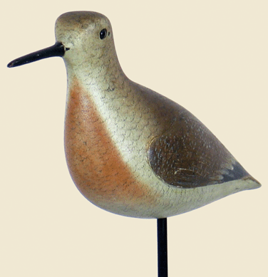 John Dilley's red knot decoy, in breeding plumage with carved wings and shoulders, was the top lot of Decoys Unlimited's sale at $51,750.