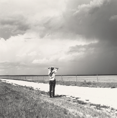 Robert Adams (American, b 1937), "Kerstin enjoying the wind. East of Keota, Colorado,†1969, gelatin silver print, National Gallery of Art, Washington, Pepita Milmore Memorial Fund and gift of Robert and Kerstin Adams.