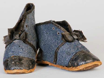 Baby shoes made around 1863 by Confederate officer Maxwell T. Clarke for his daughter Mary Grace Clarke were made of leather and woolen broadcloth, possibly from his own shortened uniform coattails. The stitching was completed by a sailor aboard Clarke's ship. Such skills kept many adults from going barefoot.