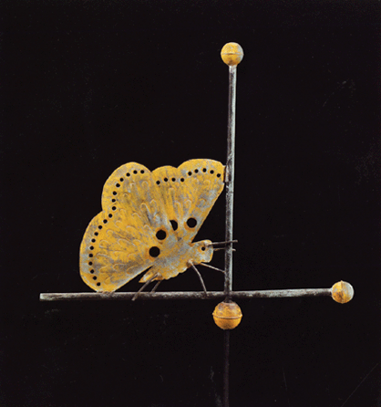 The catalog cover lot, a copper butterfly weathervane, attributed to Fiske, late Nineteenth Century, pierced cutout sheet copper with copped wire antennae, yellow and verdigris surface with traces of early gilding, measures 20¼ inches high, 22¼ inches wide, and was estimated at $8/12,000. It realized $41,475.