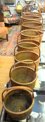 The nest of eight Nantucket baskets attributed to Andrew Jackson Sandsbury, circa 1890, sold at $40,600.