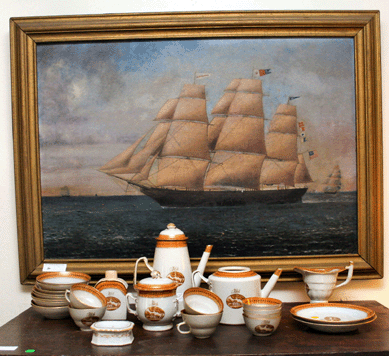 Mallory descendants bid up prices for family heirlooms. The Mallorys figured prominently in the shipping and shipbuilding industries in the Nineteenth Century. Their former shipyard is the site of present day Mystic Seaport Museum. This unsigned painting is thought to depict the Eliza Mallory, built at the Mallory shipyard for the Hurlburt line in 1851‵2 and wrecked in Florida in 1859. It sold to antiques dealer Glenn Randall for $32,200. Incomplete and damaged, the 20-piece-plus initialed Chinese Export porcelain tea and coffee service brought $484.