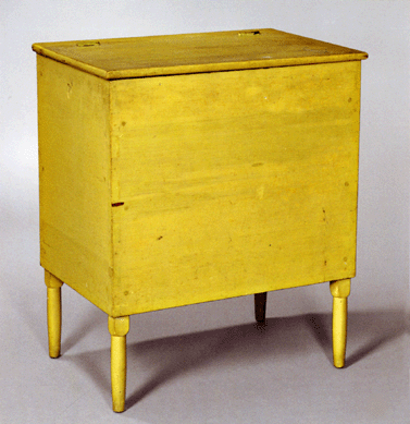 Lot 29, from the Brown Collection of Shaker, was a pine and maple chrome yellow painted storage bin, Mount Lebanon of Hancock community, circa 1830‱850, on turned legs, measuring 32 inches high, 27 inches wide and 18 inches deep, sold for $29,625 against an estimate of $8/12,000.