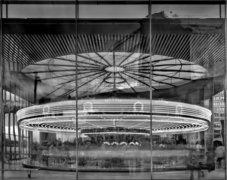 Matthew Pillsbury, "Jane's Carousel, Brooklyn Bridge Park (2011),†2011, pigment ink print, 41 by 49 inches. Courtesy of the artist and the Bonni Benrubi Gallery.