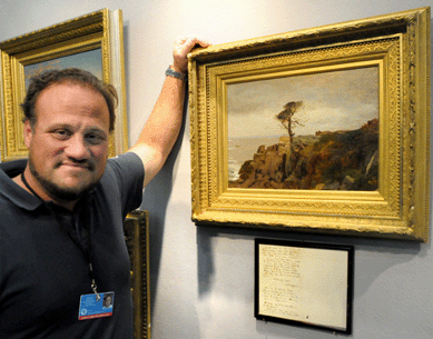 New York City dealer Dean Borghi with a small oil on canvas by Sanford Gifford titled "No Man's Island.†Accompanying the lot was a letter penned by Gifford that the dealer discovered after purchasing the painting in which the artist refers to visiting the region and executing the painting.