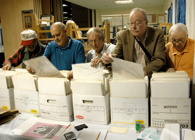 There is always a crowd rifling through postcards and sheet music offered by Michael Seaman, Albany, N.Y.