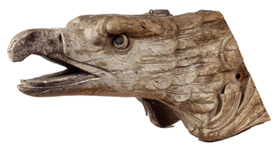 Several floor bidders and five phones were all active at the start of bidding for lot 80, a ship figurehead in the form of a Federal eagle, open beak, early Nineteenth Century, found in a Bath, Maine, barn. It is early enough and of the scale to have been on a US Customs cutter, measuring 14 inches tall, 26 by 11 inches, with remnants of the original paint. At the end it narrowed down to two phones, with the winner paying $40,250. The high estimate was $6,000.