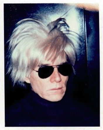 Andy Warhol (1928‱987), "Self-Portrait with Fright Wig,†1986, unique Polacolor ER print, 4¼ by 33/8  inches ($15/20,000).