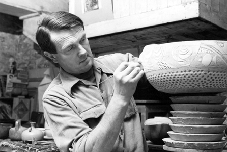 Frans Wildenhain working on a ceramic piece in his home studio, Bushnell's Basin, N.Y., circa 1965. Photo courtesy of RIT Archive Collections