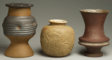 Pots by Wildenhain, from left: stoneware vessel, earthenware, reduction fired, 12½ by 8 inches; stoneware vase, raw clay exterior 9 by 8¾ inches; and earthenware vase, reduction fired, red with white glaze, 11½ by 7¾ inches. Photo ©2012 by A. Sue Weisler.