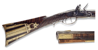 The signature features of the work of Melchoir Fordney are displayed on the .45 caliber rifled octagonal barrel long rifle, circa 1810, Lancaster Borough, Penn. Included are the cross-hatched wrist, flowing carving forward of the lock, the spiral engraved muzzle cap and the intricately engraved patch box. Collection of Jane Spencer.