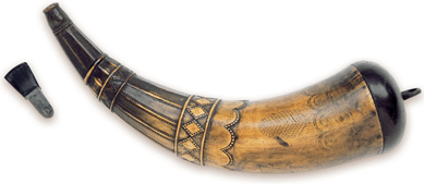An elaborately carved powder horn bearing the initials "JF,†possibly Joel Ferree, one of the most prominent gunsmiths of the Revolution. Collection of Paul Warre.