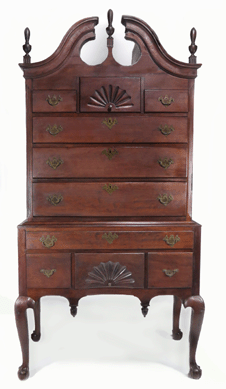 An Eighteenth Century Connecticut Chippendale cherry highboy brought $9,945.