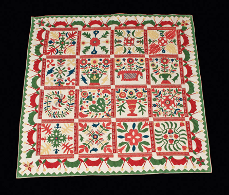 This outstanding Baltimore album quilt led the textiles auction at $28,750.