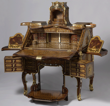 Abraham Roentgen (German, 1711‱793), writing desk, circa 1758-62, oak, sycamore, walnut, and cherrywood, with sycamore, purplewood, kingwood, pear wood, olive, barberry, boxwood, plane, sycamore, various burlwoods and other woods (partly stained); tortoiseshell, mother of pearl, ivory (partly stained); gilt bronze, brass, copper and silver, 58¼ by 44½ by 24 3/8  inches. Rijksmuseum, Amsterdam, The Netherlands.