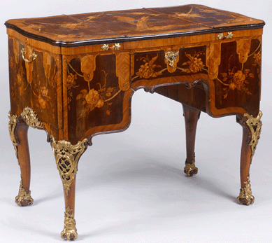 Abraham and David Roentgen (German, 1711‱793 and 1743‱807), dressing table, 1769, walnut, oak, cherry, and pear wood, veneered with palisander wood, kingwood, maple, boxwood, and ash; mother of pearl and ebony; gilt bronze, 32 5/8 by 39¾ by 24 3/8 inches. Museum für Angewandte Kunst, Frankfurt, Germany.
