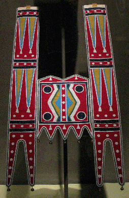 An example of a contemporary piece of horse culture Indian artistry is a martingale made in Oregon in 2007 by Maynard White Owl-Lavadour (b 1960), a member of the Nez Perce tribe, also known as the Plateau Indians. The Nez Perce often outfitted themselves along with their horses for war and ceremonial gatherings. This piece, made of seed beads, brass bells and red and blue wool cloth, is used today for parades and cultural events. Courtesy Randall and Teresa Willis.