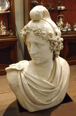The Nineteenth Century white marble of a classical figure wearing a Phrygian cap sold on the phone for $12,980.