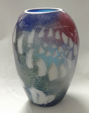 A signed and dated 1986 William Morris art glass vase, 15½ inches high, went to $2,875.