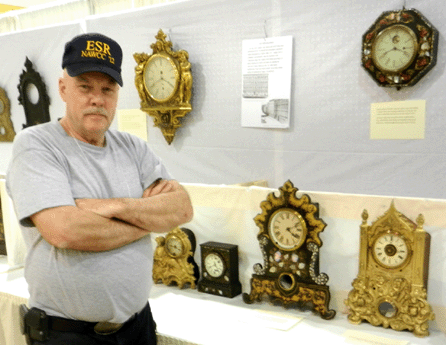 Lee Davis of York, Penn., organized the loan exhibition on Iron Front Clocks.